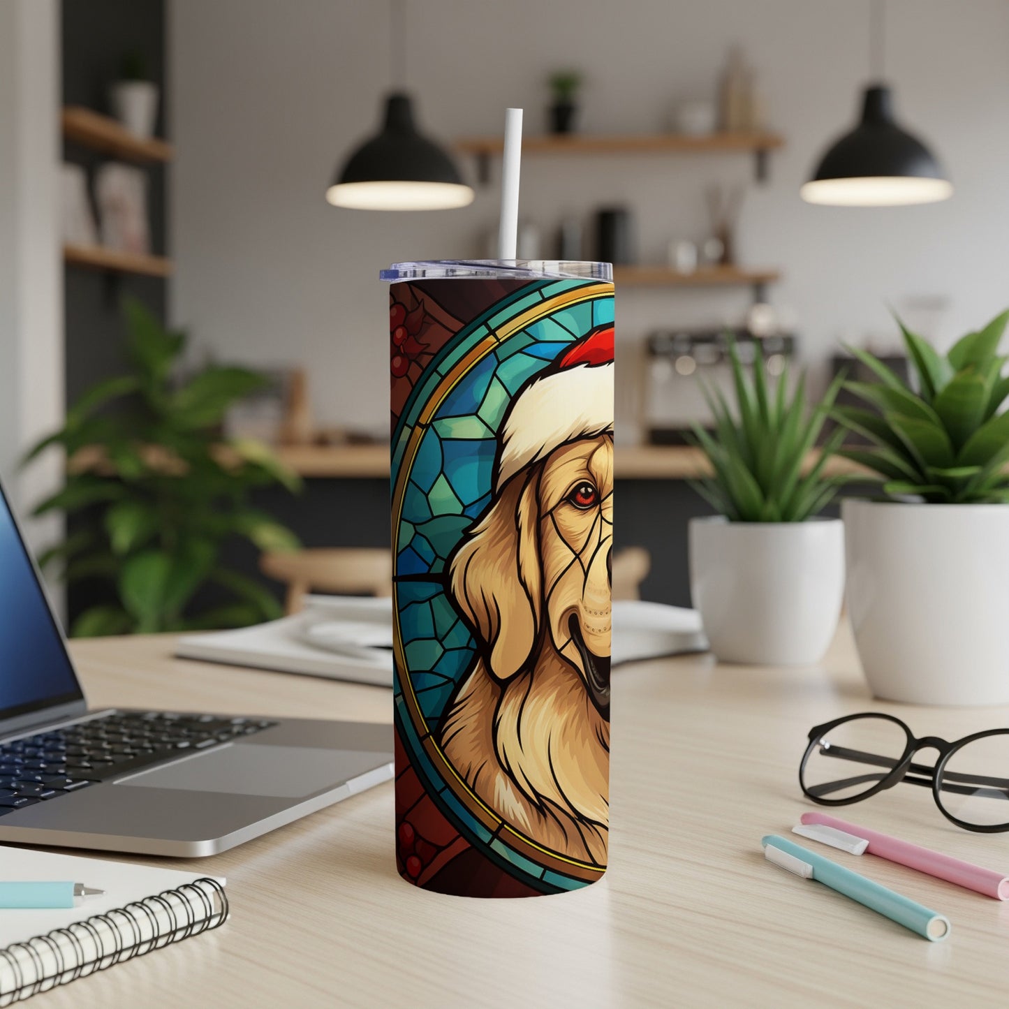 Golden retriever in Santa hat on stained glass tumbler.