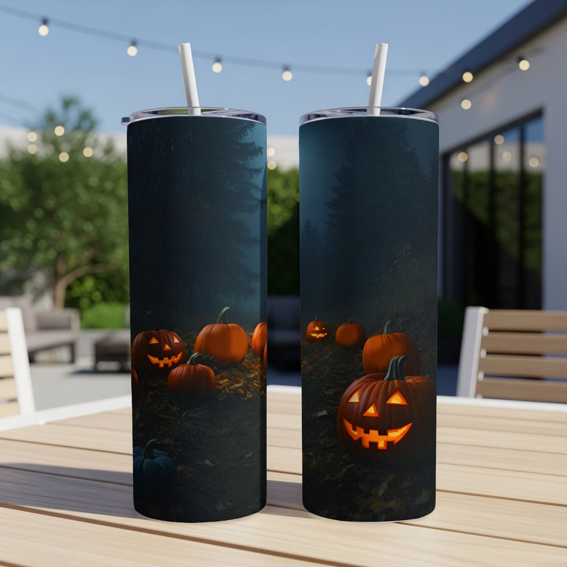 Two tumblers with a spooky forest and jack-o'-lantern design.