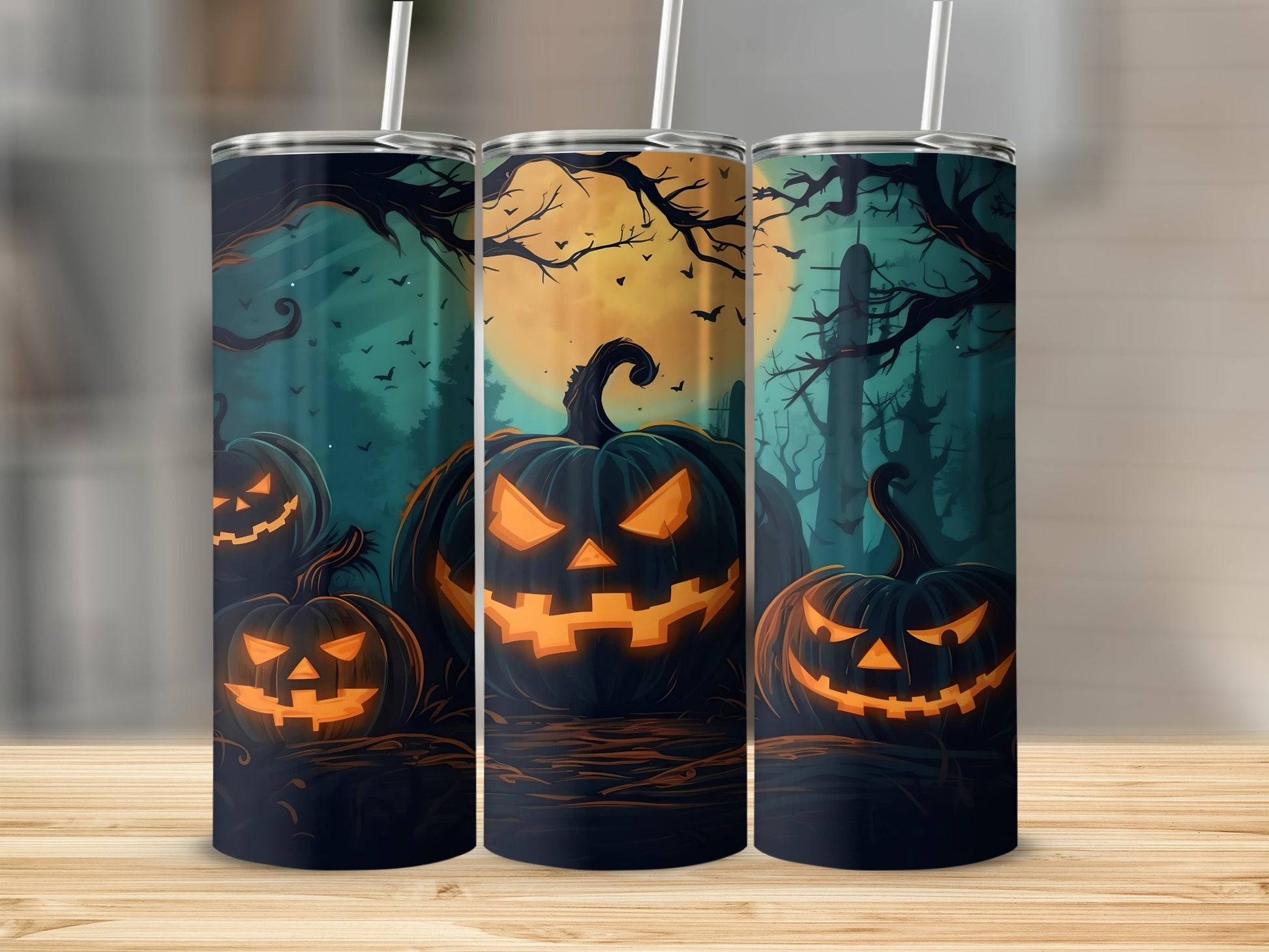 Three tumblers with a spooky Halloween scene featuring jack-o'-lanterns under a full moon.