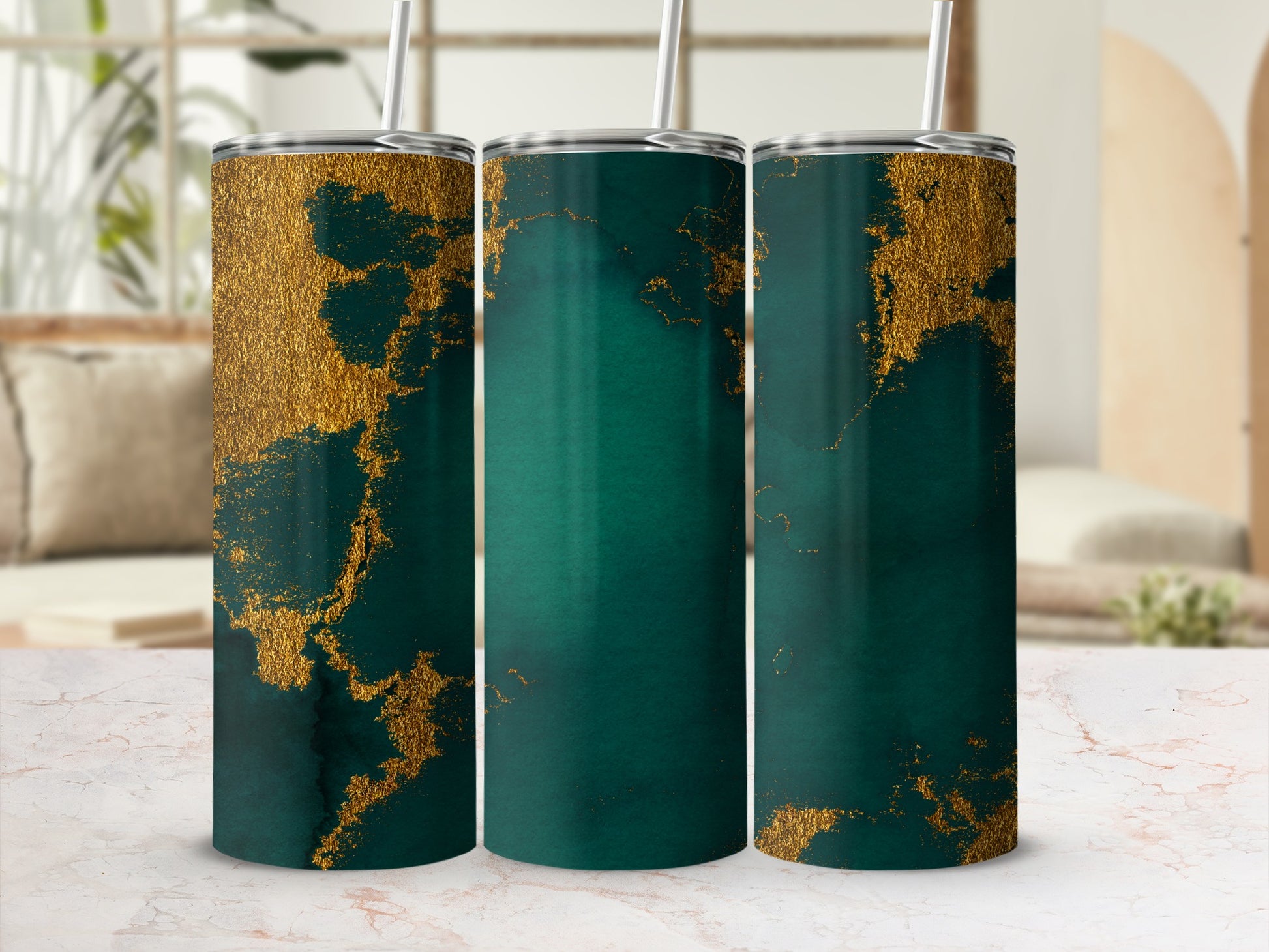 Three tumblers with a dark teal and gold abstract design.