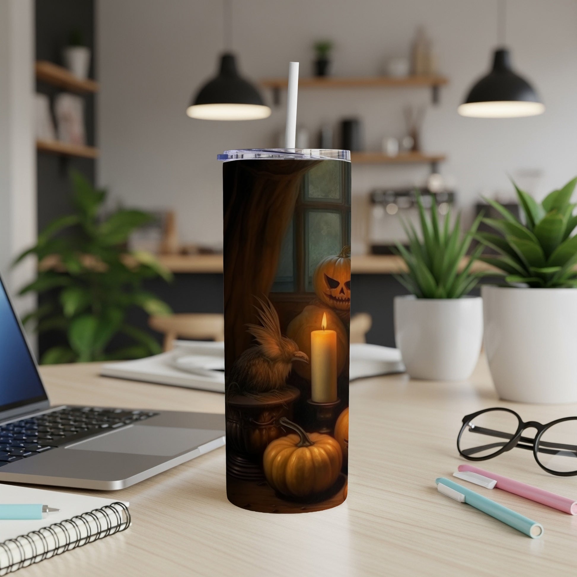 Halloween tumbler with pumpkins, candle, and a bird figure by a window.