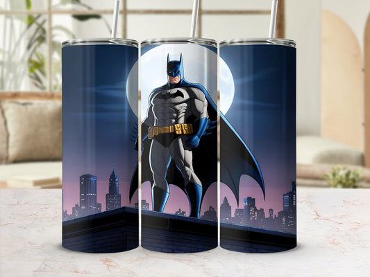 Batman standing on a rooftop against a city skyline with a full moon.