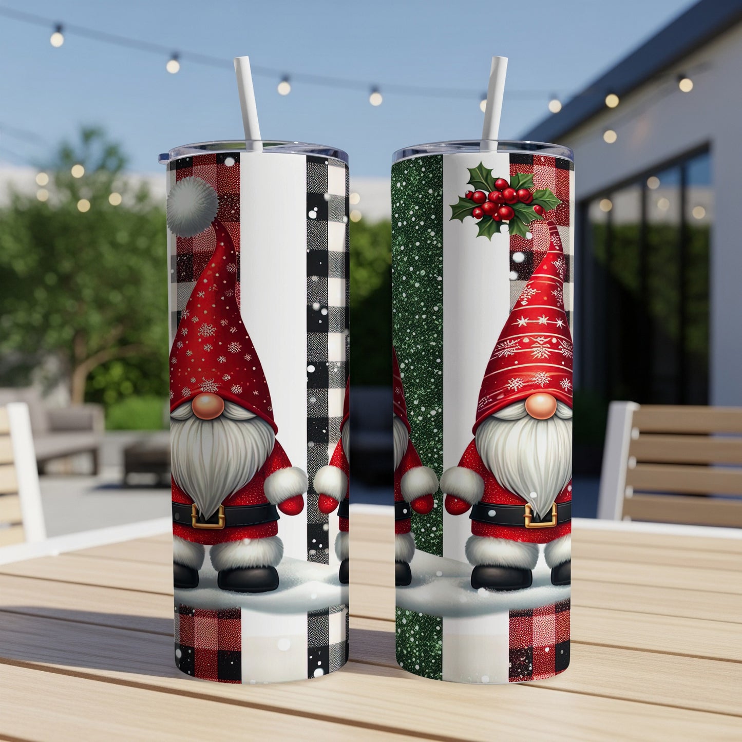 Two Christmas gnomes with red hats and snowy bases on a table.