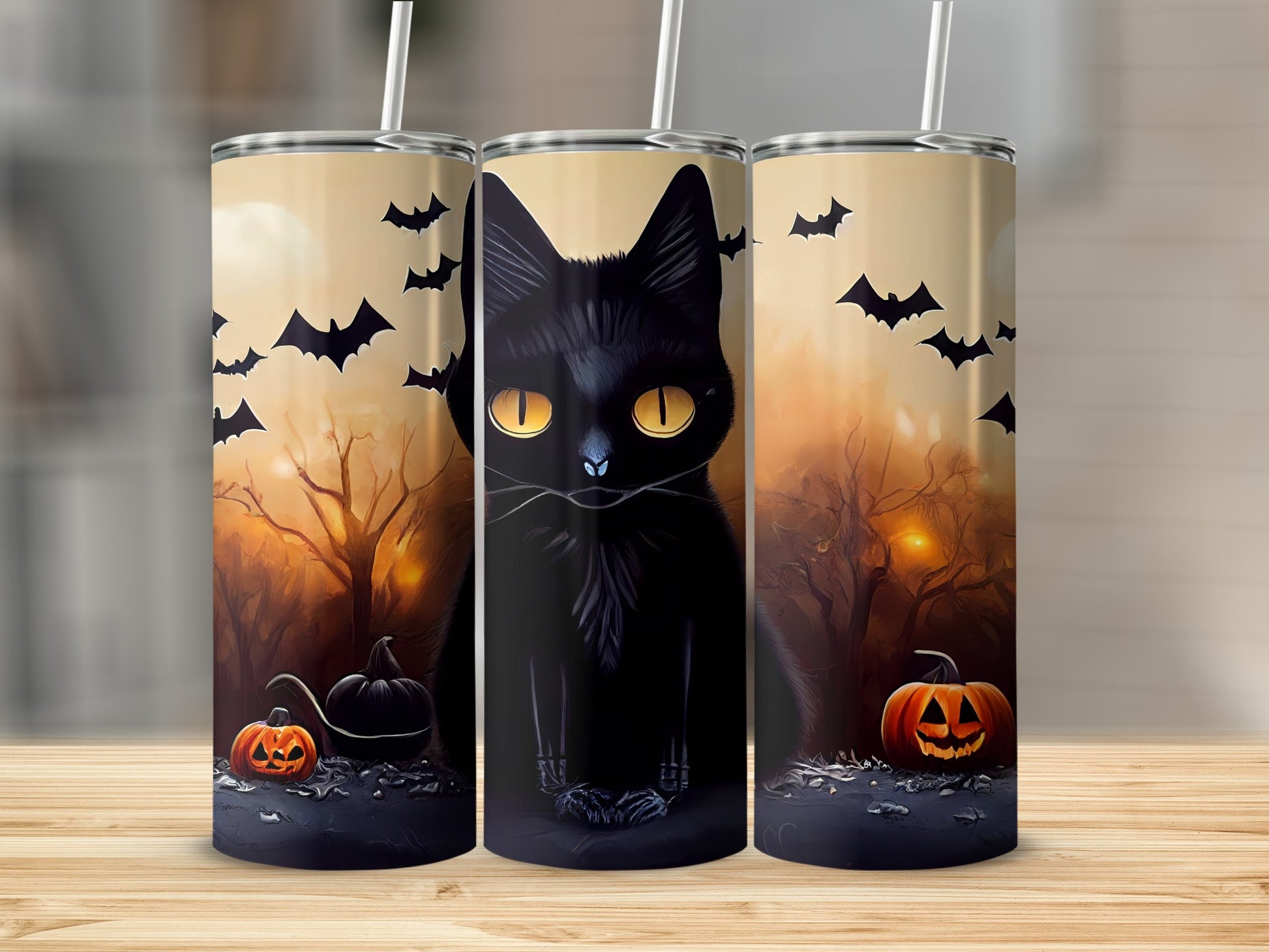 Black cat with yellow eyes and pumpkins on a Halloween-themed tumbler.