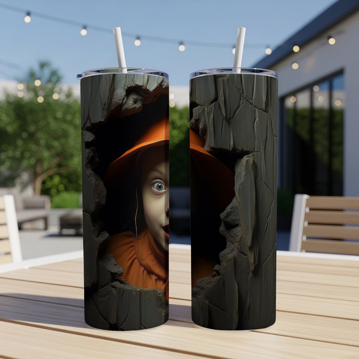 Two tumblers featuring a young child in an orange hat peering through a cracked stone design.