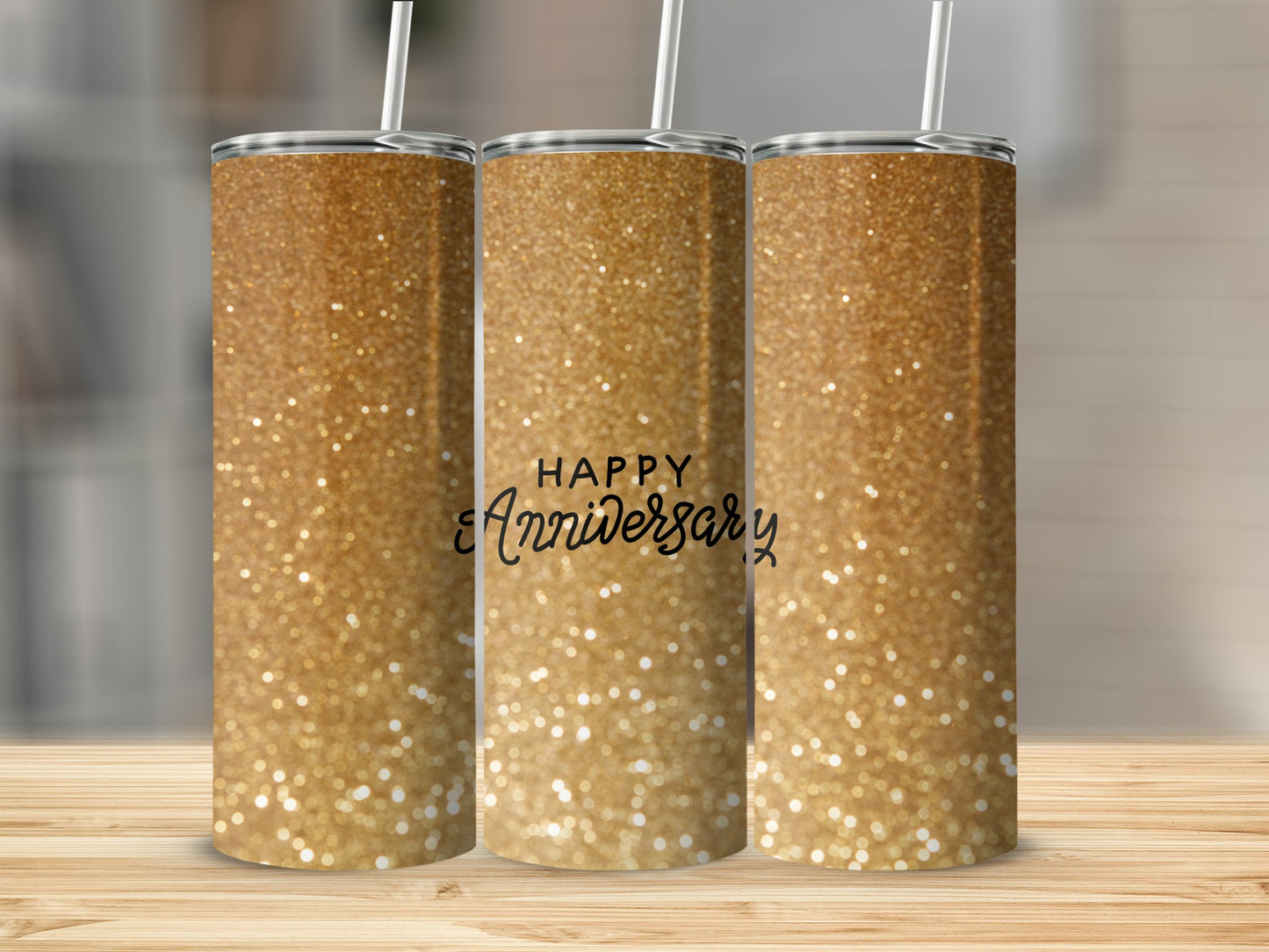 Gold glitter tumbler with "Happy Anniversary" text.