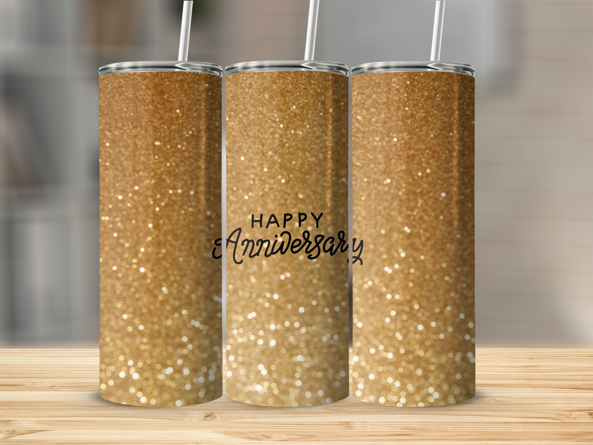 Gold glitter tumbler with "Happy Anniversary" text.