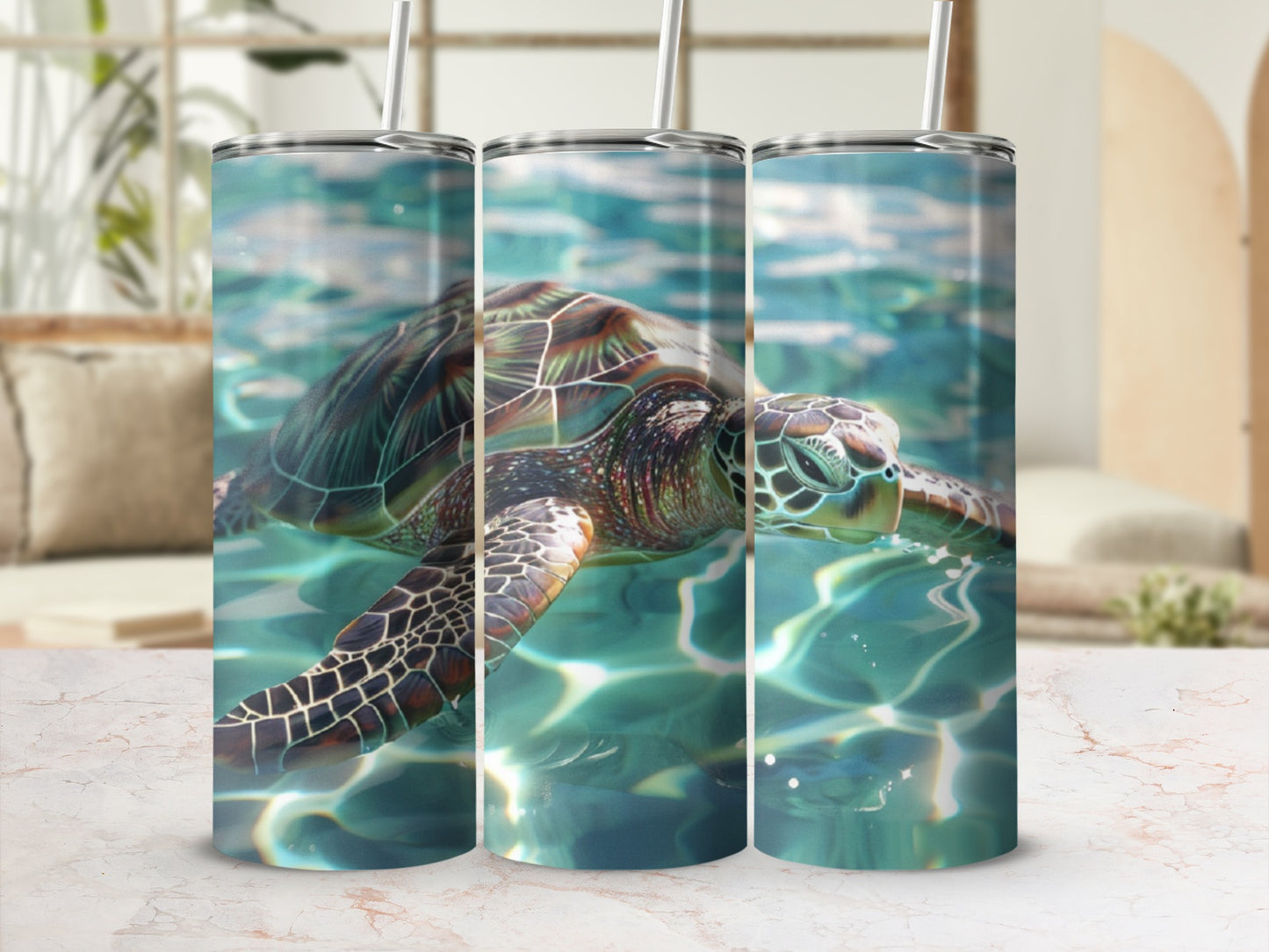 Sea turtle swimming in clear blue water, depicted on three tumblers.