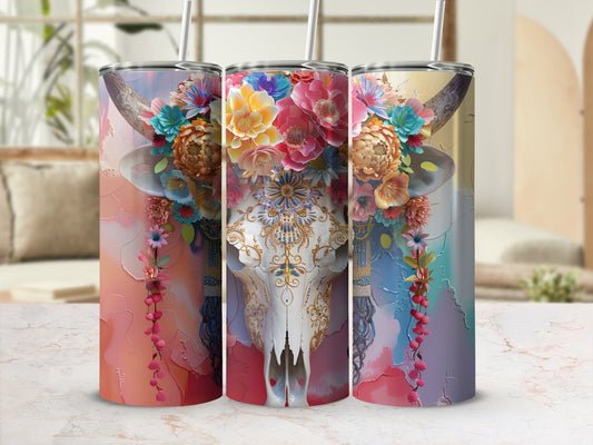 Floral skull tumbler with colorful watercolor background and straw.