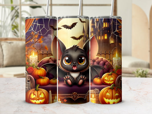 Halloween tumbler with cute bat, pumpkins, castle, and bats in moonlit sky.