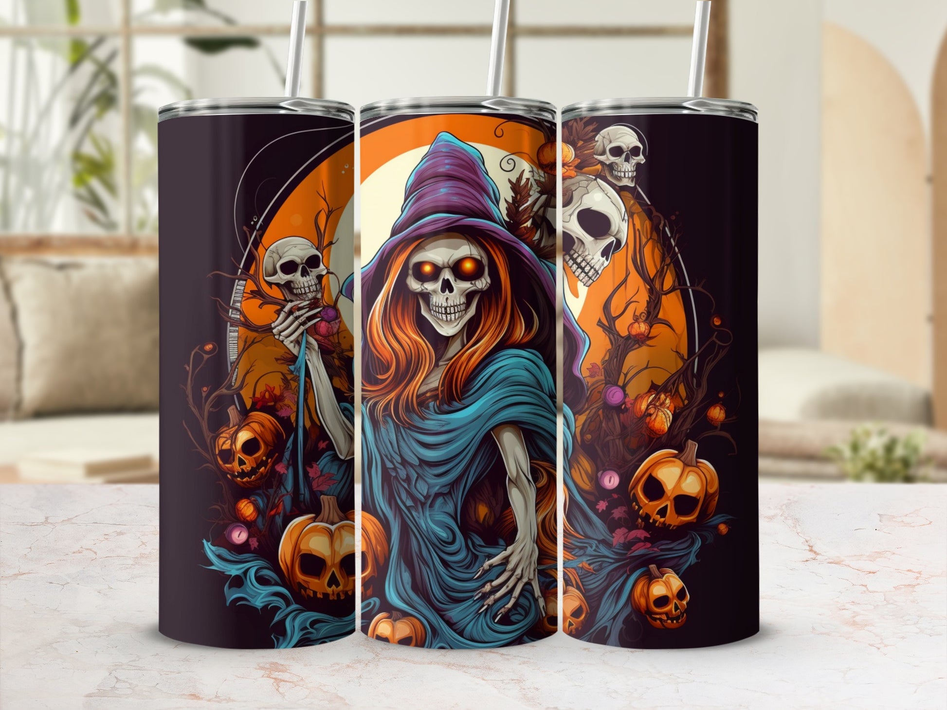 Three Halloween tumblers featuring a witch skeleton, pumpkins, and skulls.