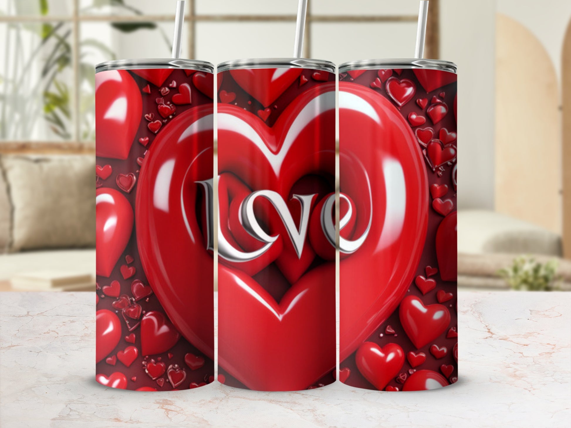 Three red heart-shaped tumblers with "love" embossed on the front, against a red heart background.