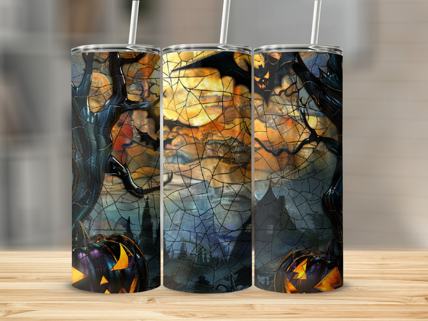 Halloween tumbler with pumpkins, bats, and moonlit castle scene.