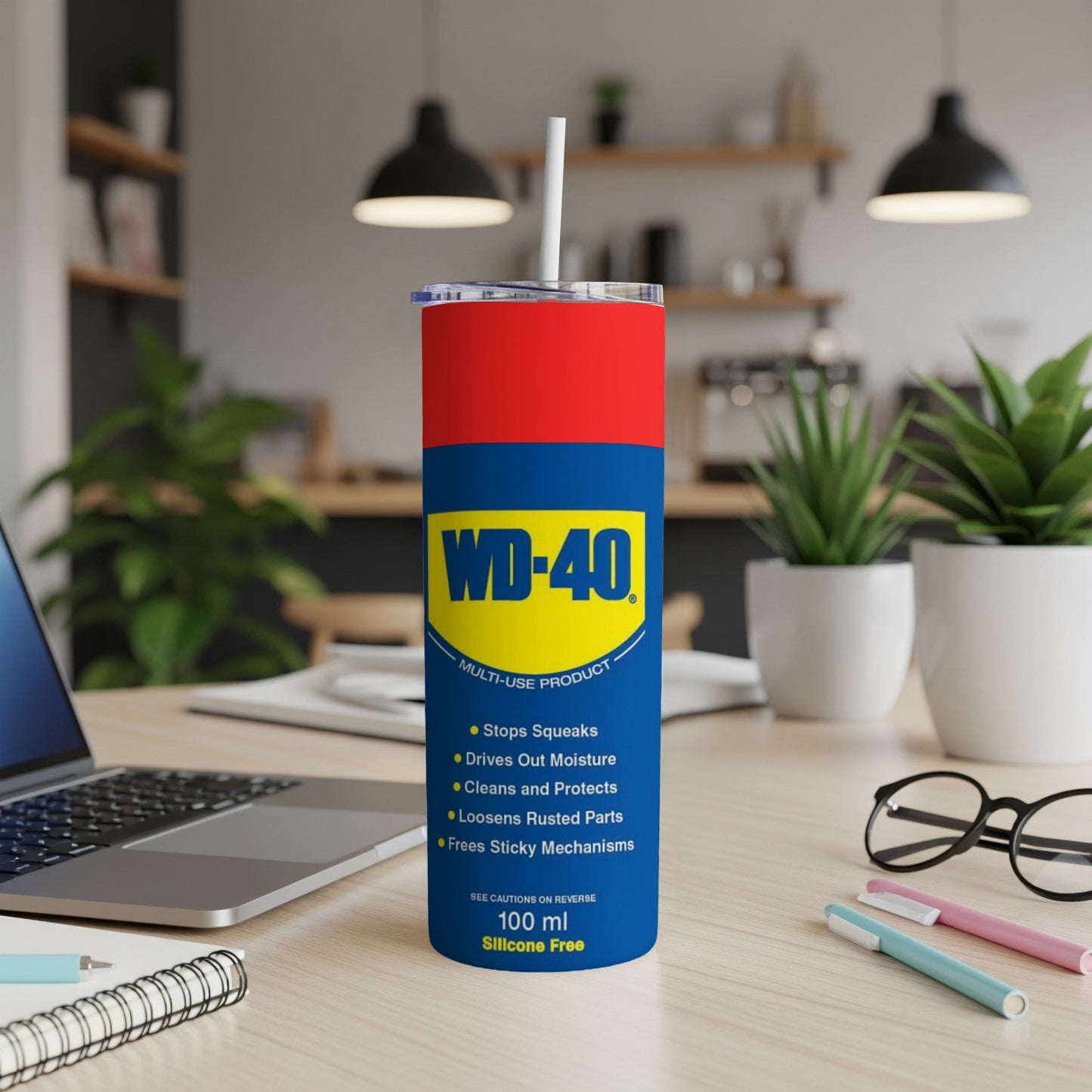WD-40 multi-use product tumbler with blue and yellow label.