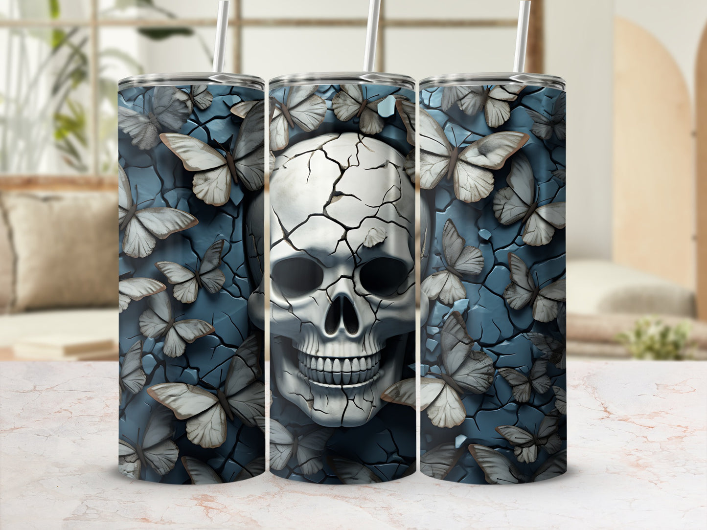 Cracked skull and butterflies design on three tumblers.