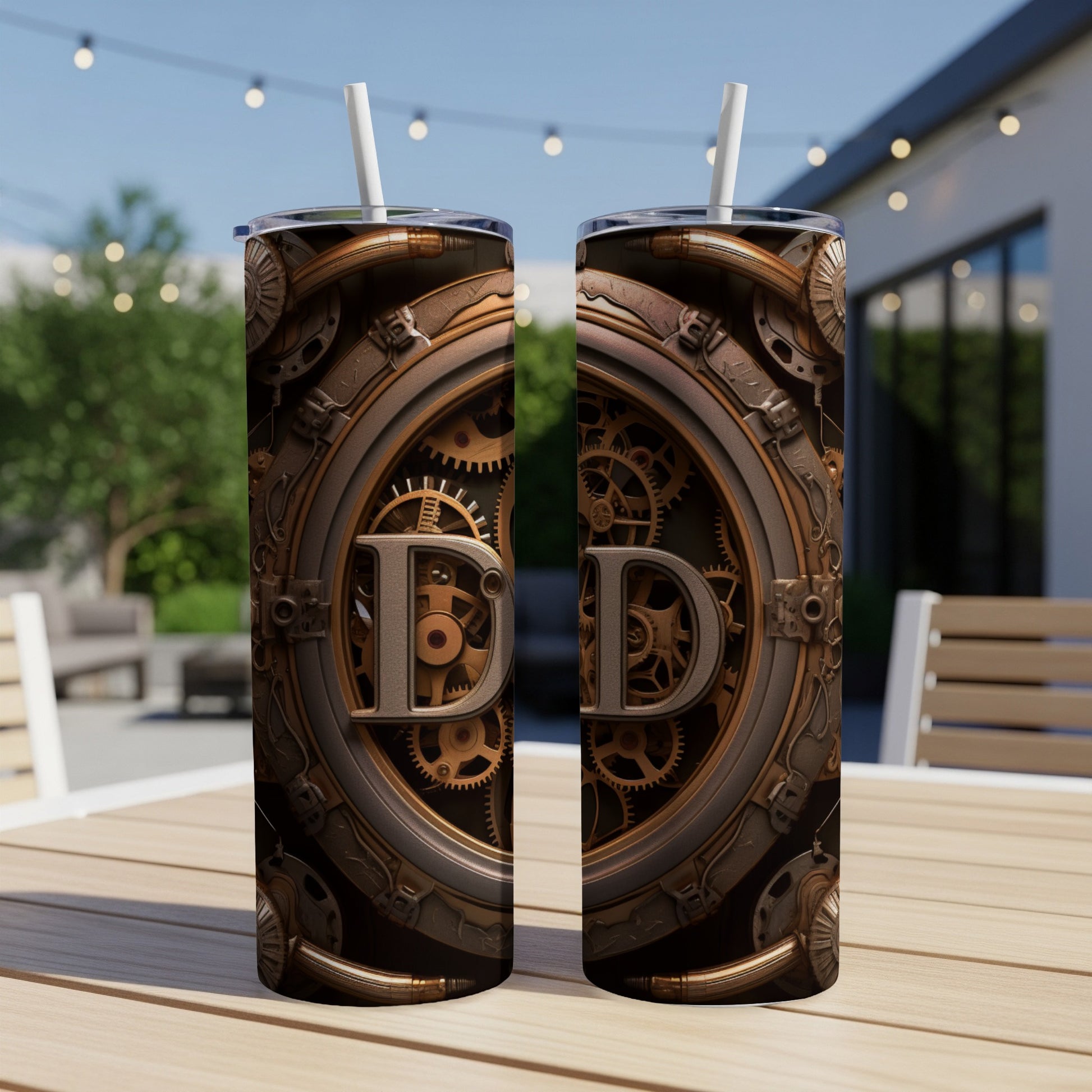 Two tumblers with steampunk gear design and a prominent gold letter D.