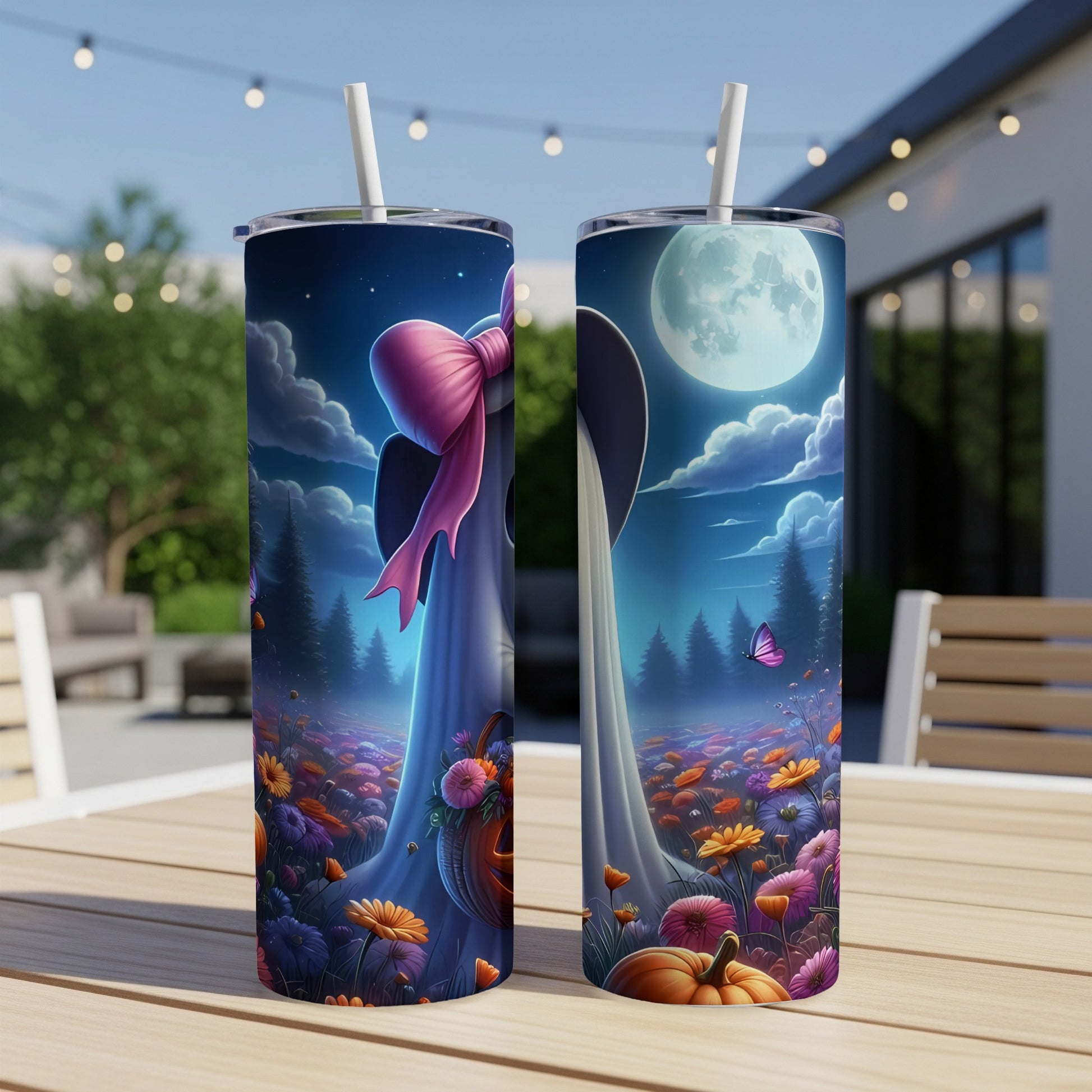 Two tumblers with a Halloween night scene featuring a ghost, moon, and floral pumpkin patch.