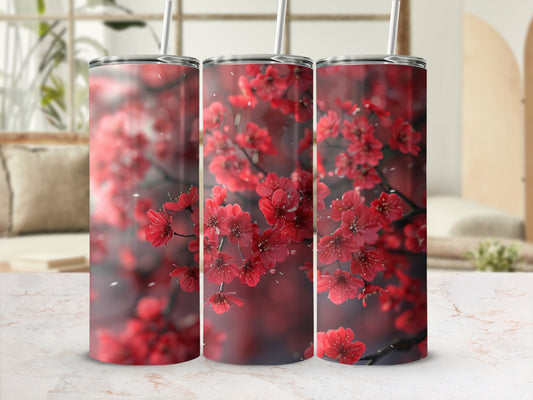 Three tumblers with a close-up of blooming red cherry blossoms.