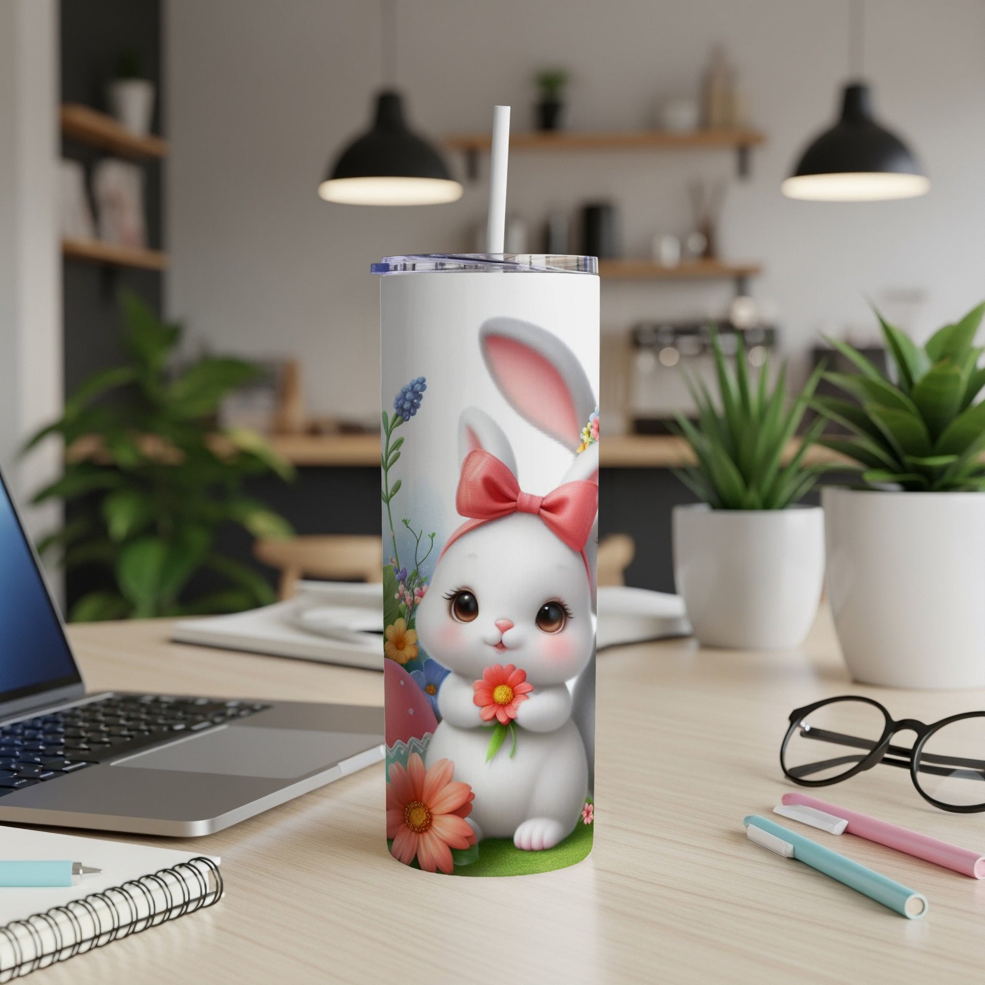 Cute Easter bunny holding flower on white tumbler.