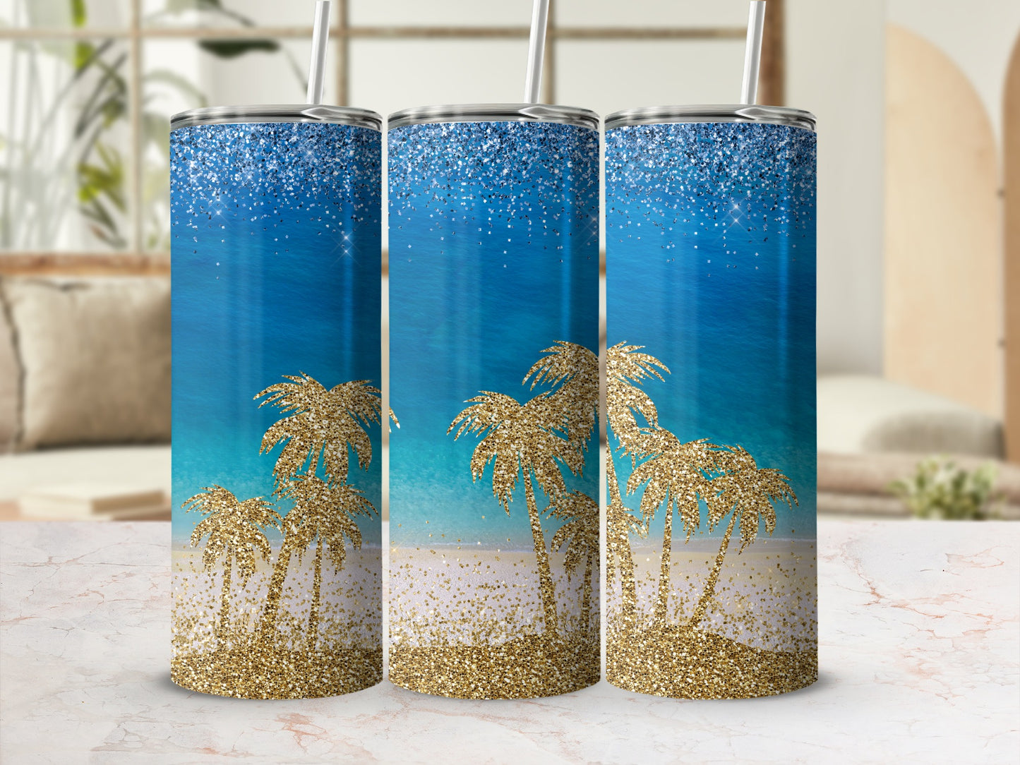 Glittery tumblers with palm trees and ocean scene.