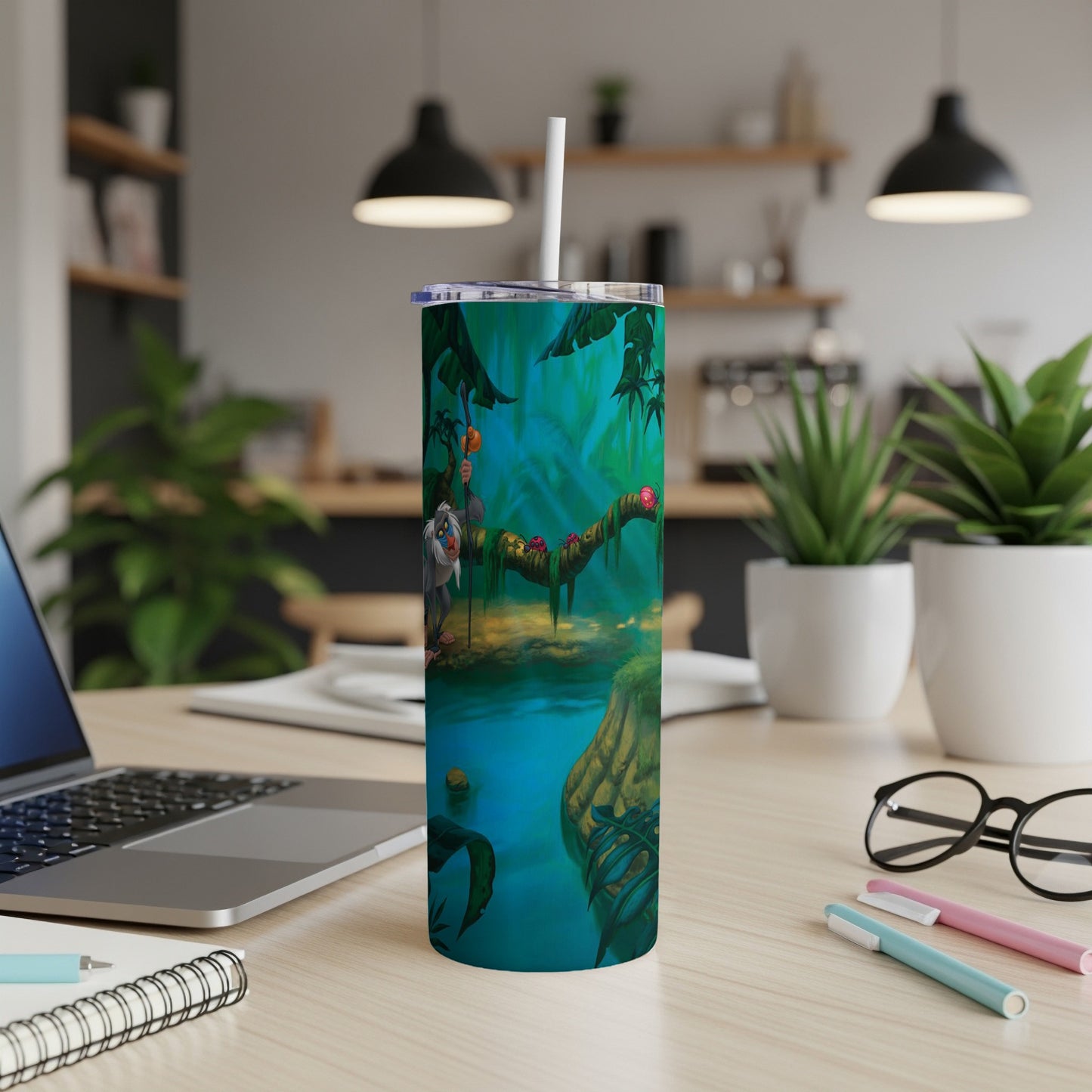 Jungle scene tumbler with King Louie on a branch above water.