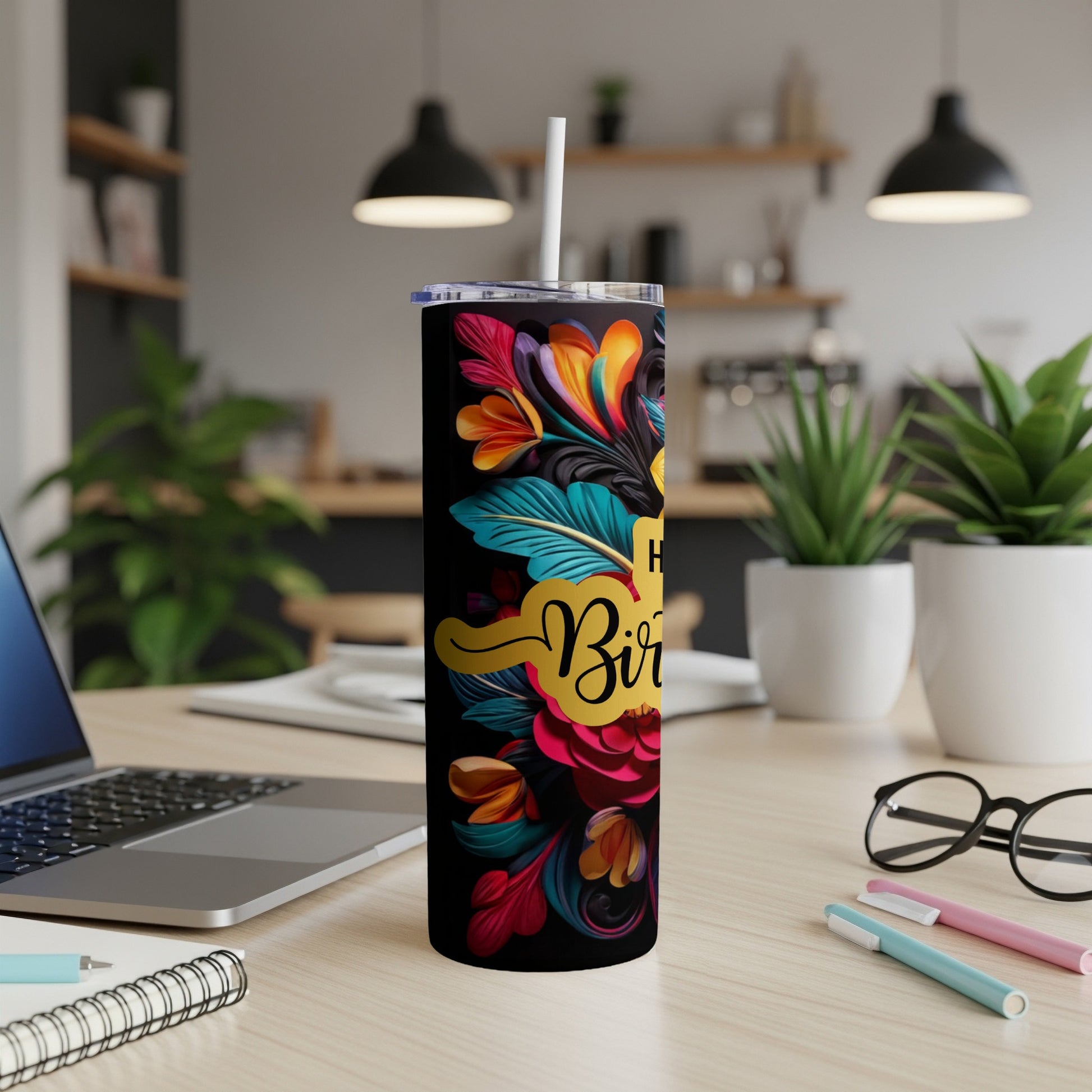 Black tumbler with colorful floral design and "Happy Birthday" text.
