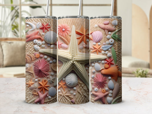 Three tumblers with starfish, shells, and sea creature designs.