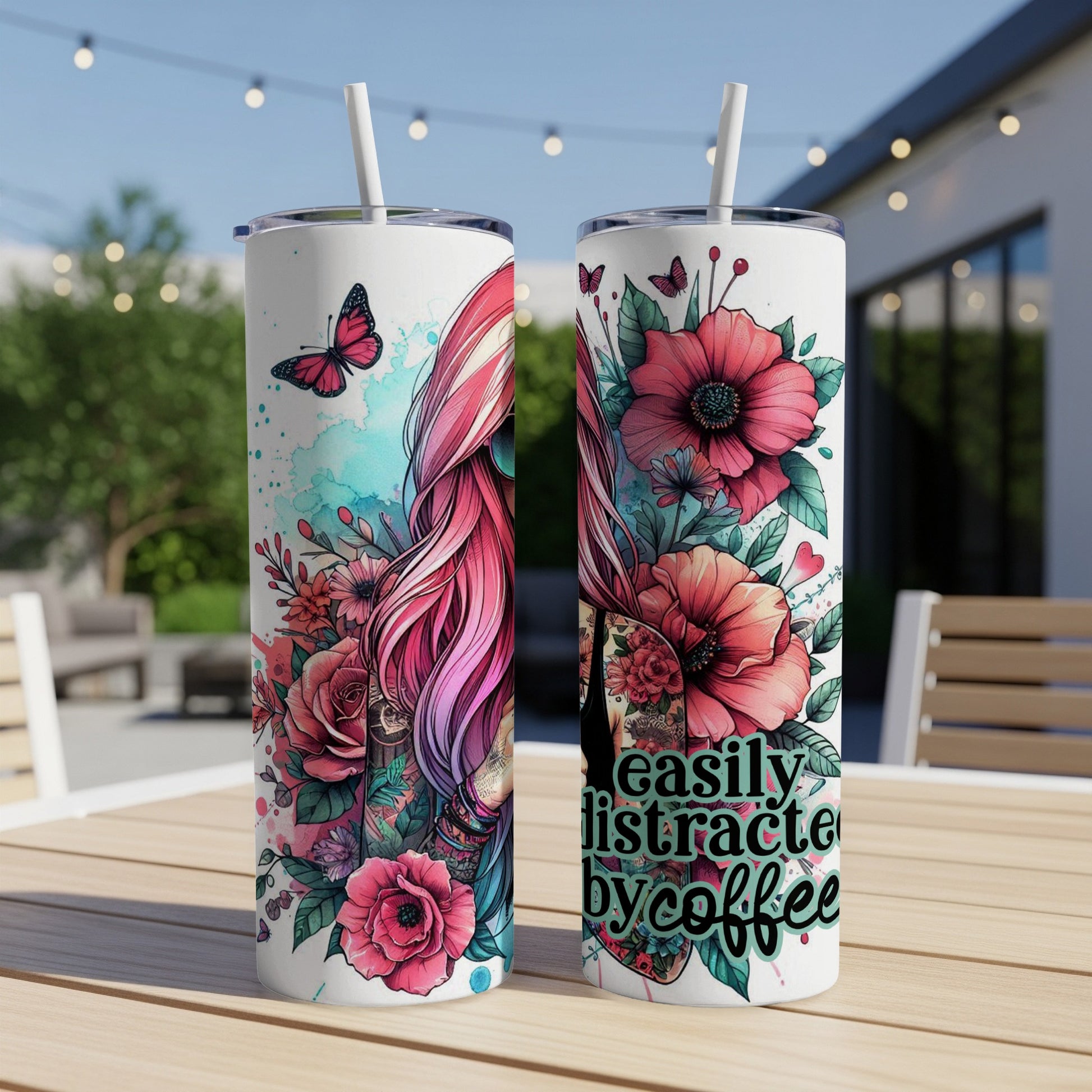Two tumblers with pink hair and floral designs, one with "easily distracted by coffee" text.