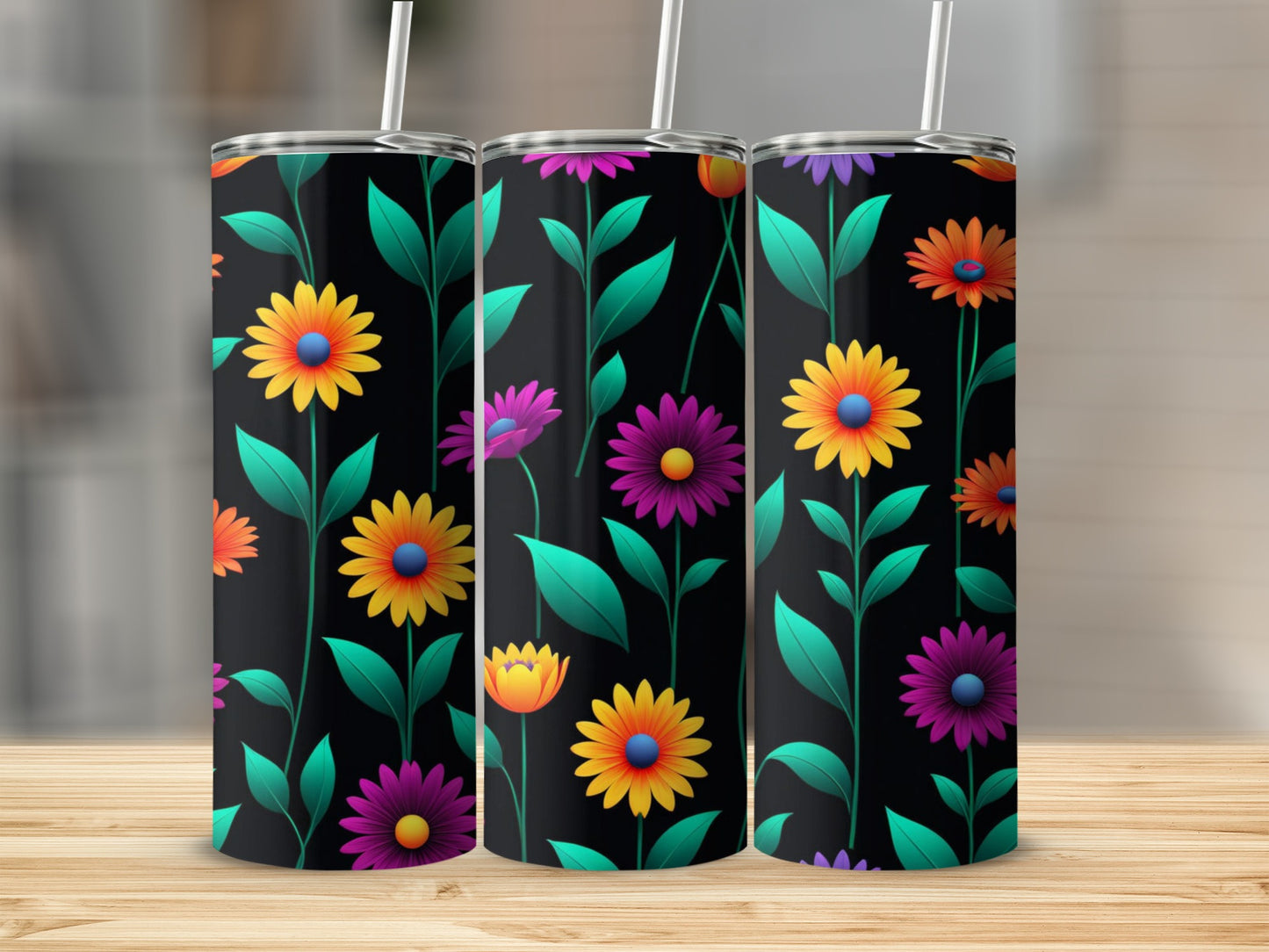 Three tumblers with a colorful floral and leaf pattern on a black background.