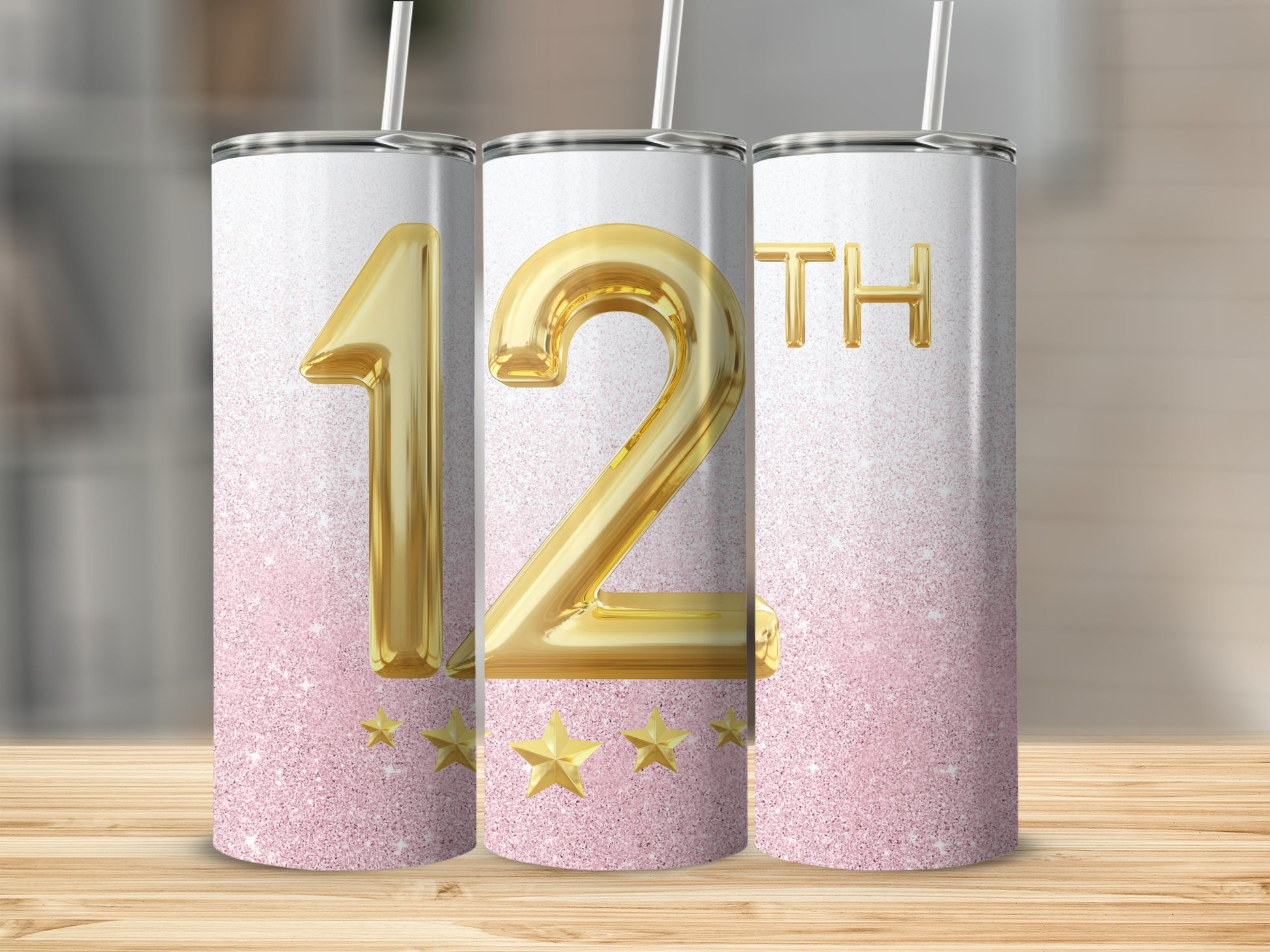 Gold "12TH" with stars on a pink glitter tumbler.