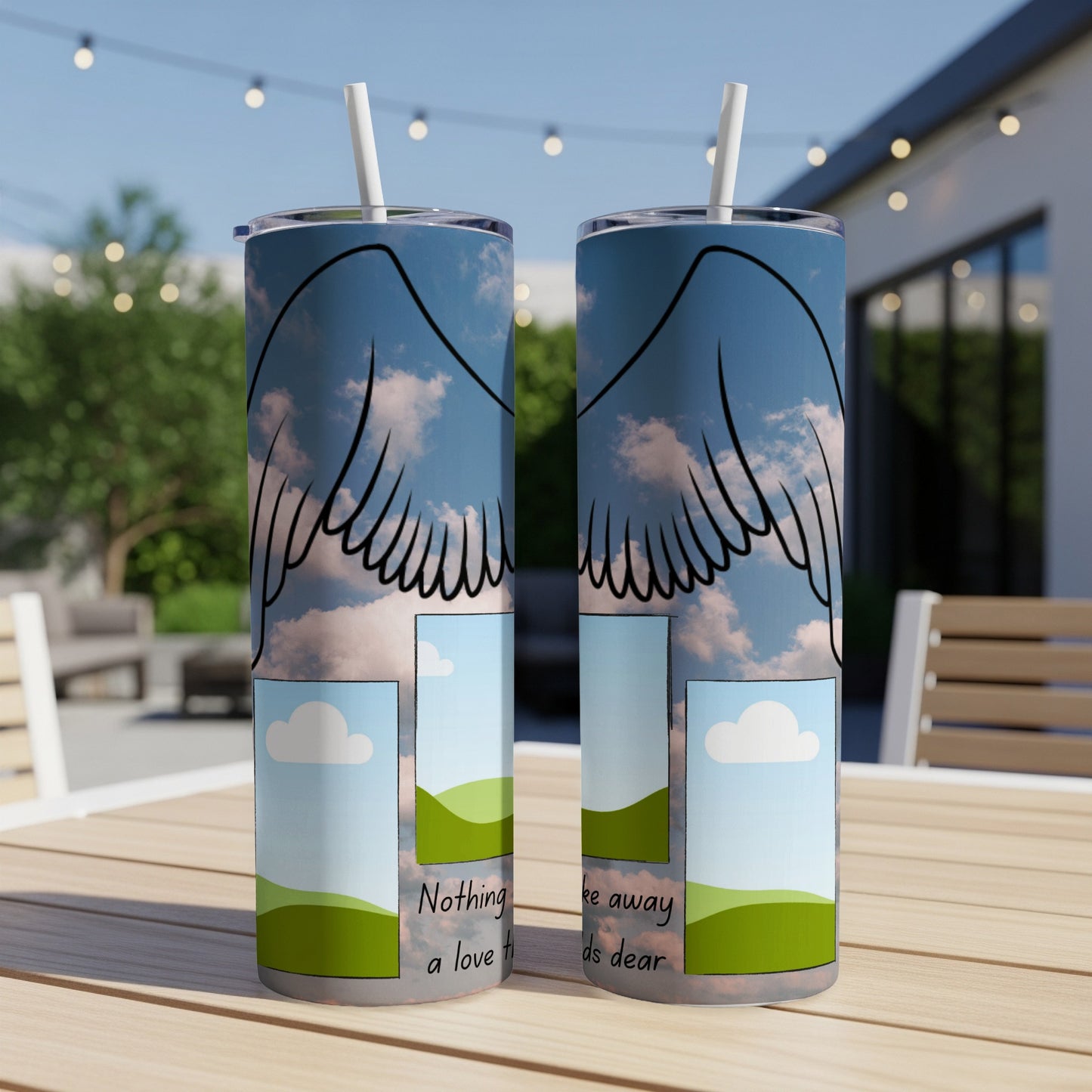 Two tumblers with angel wings and sky design, featuring text "Nothing can take away a love that holds dear".