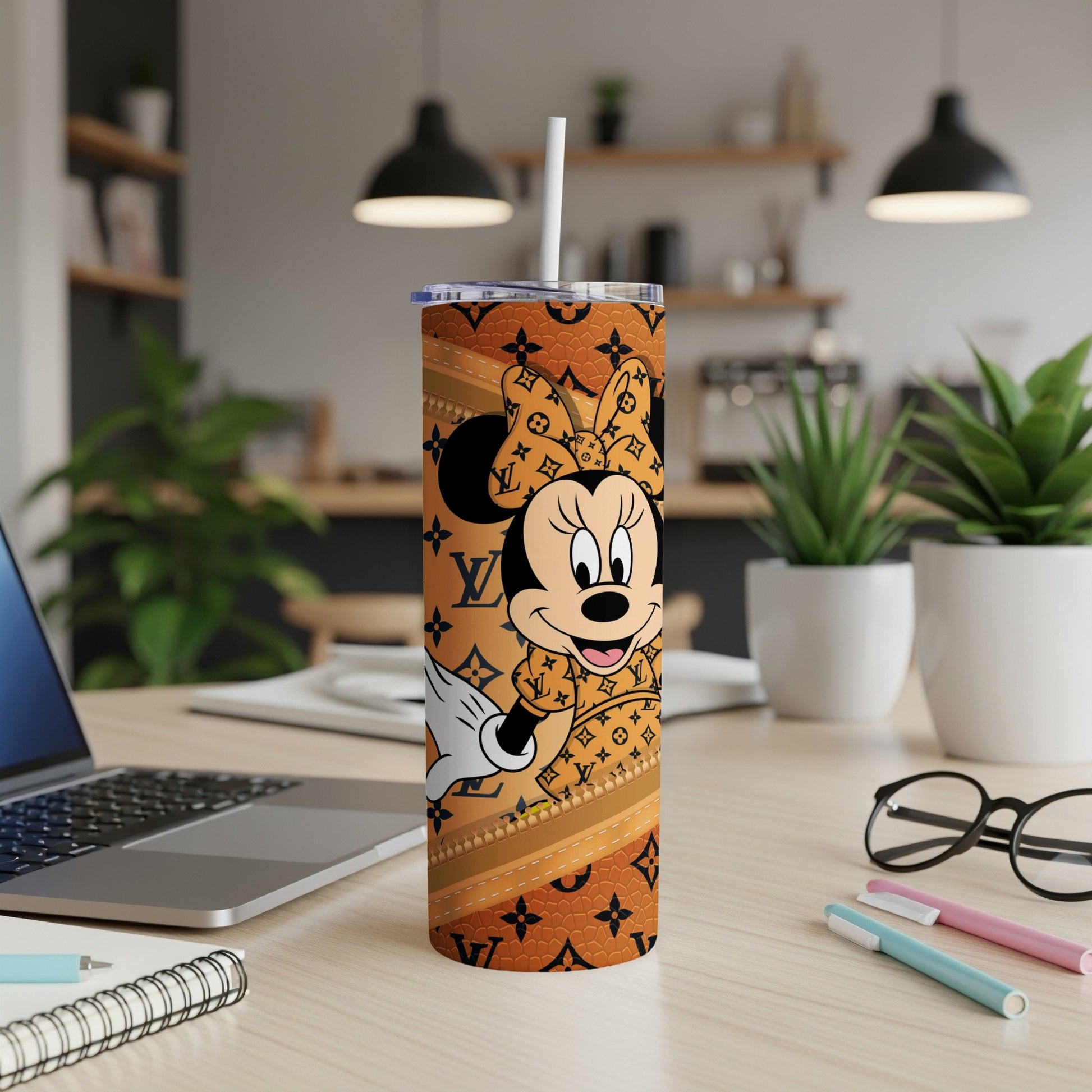 Minnie Mouse on a tumbler with LV monogram pattern, white straw.
