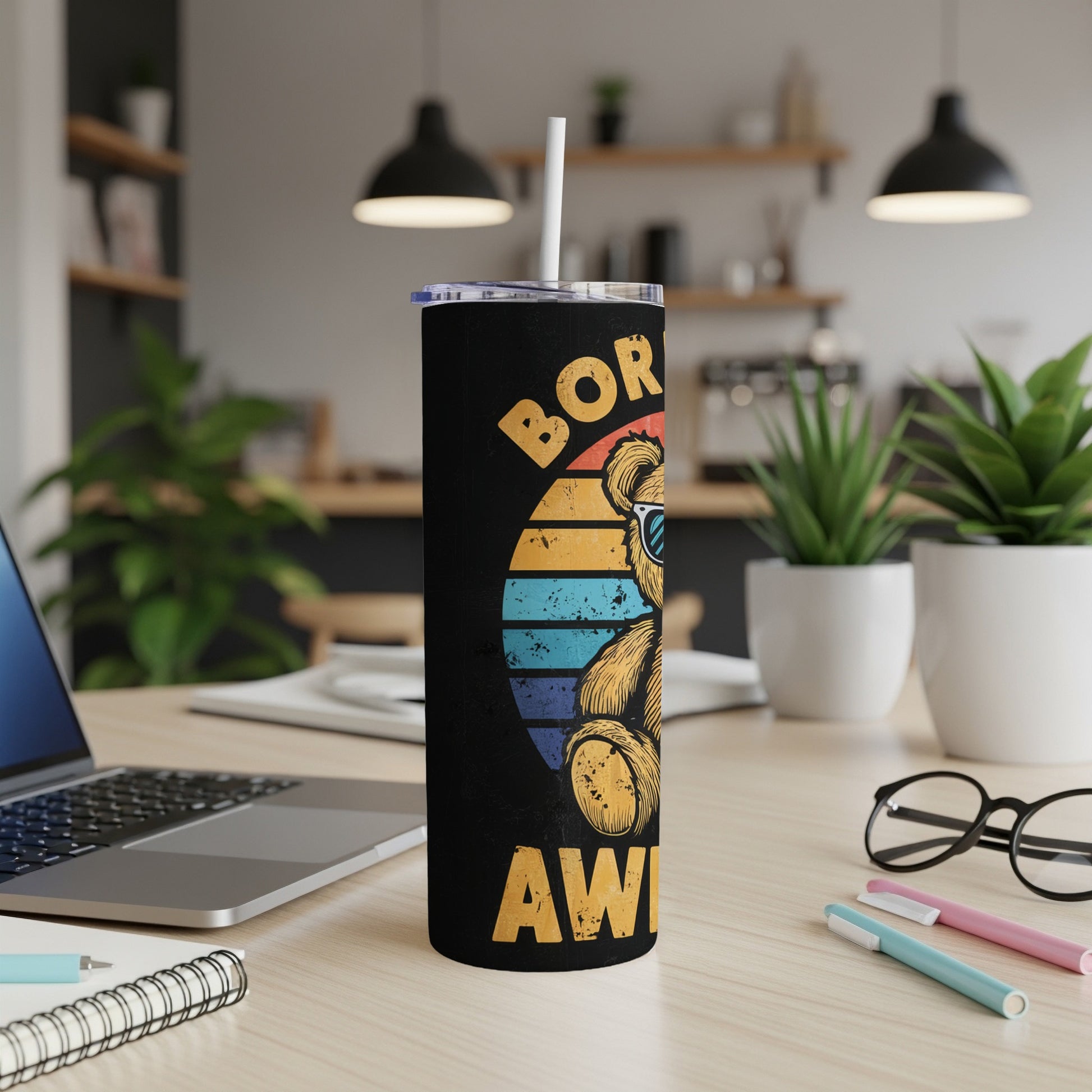 Black tumbler with retro teddy bear wearing sunglasses and text "BORN AWESOME".