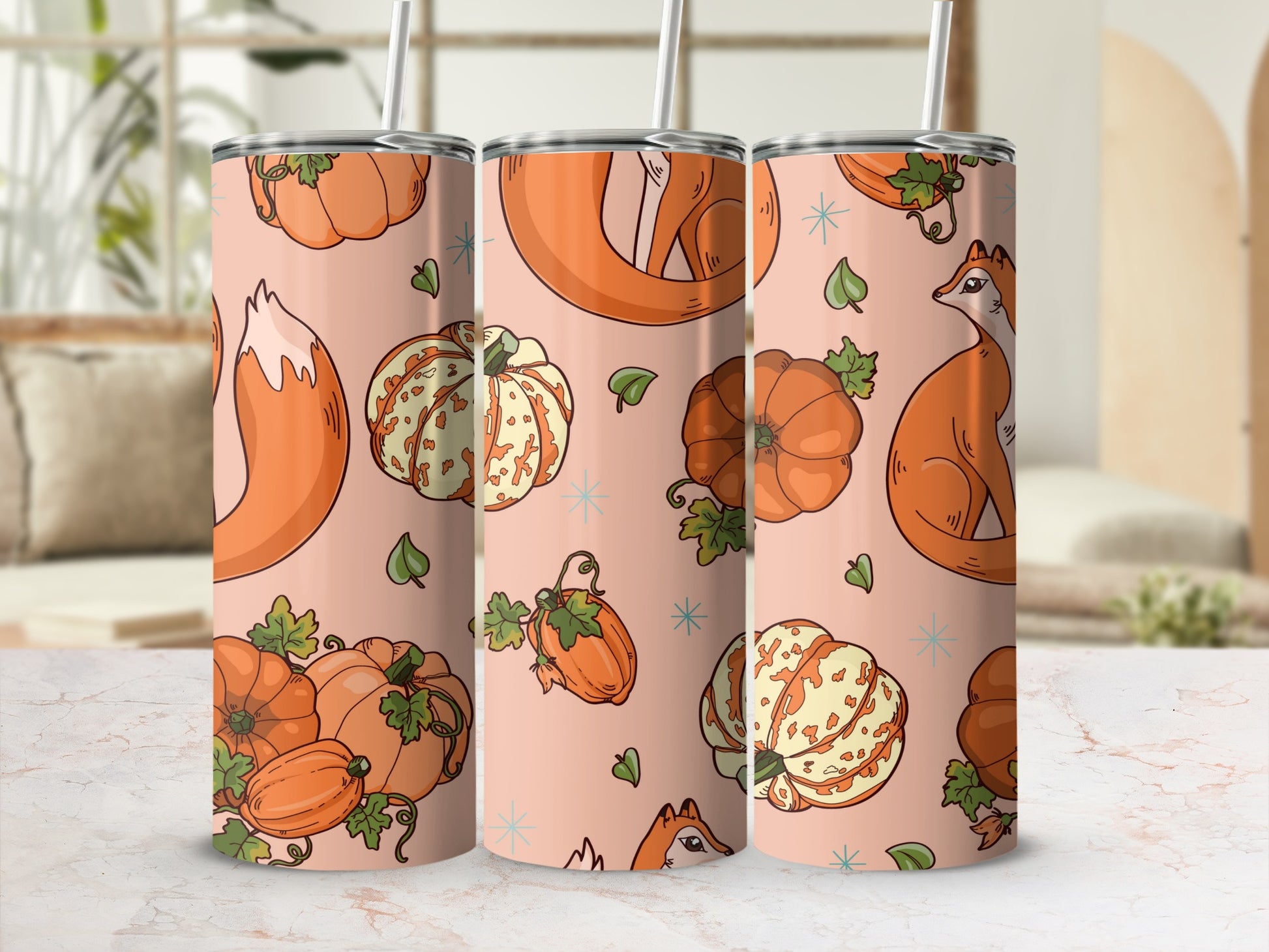 Orange fox and decorative pumpkins pattern on a pale pink tumbler.