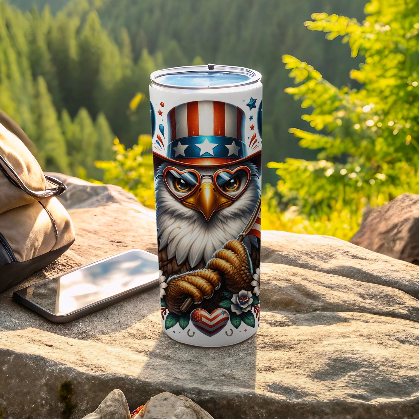 Eagle wearing heart-shaped sunglasses and patriotic hat on a tumbler.