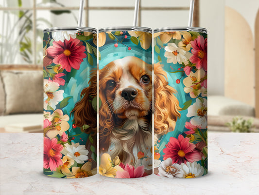 Cavalier King Charles Spaniel face surrounded by colorful floral watercolor art.