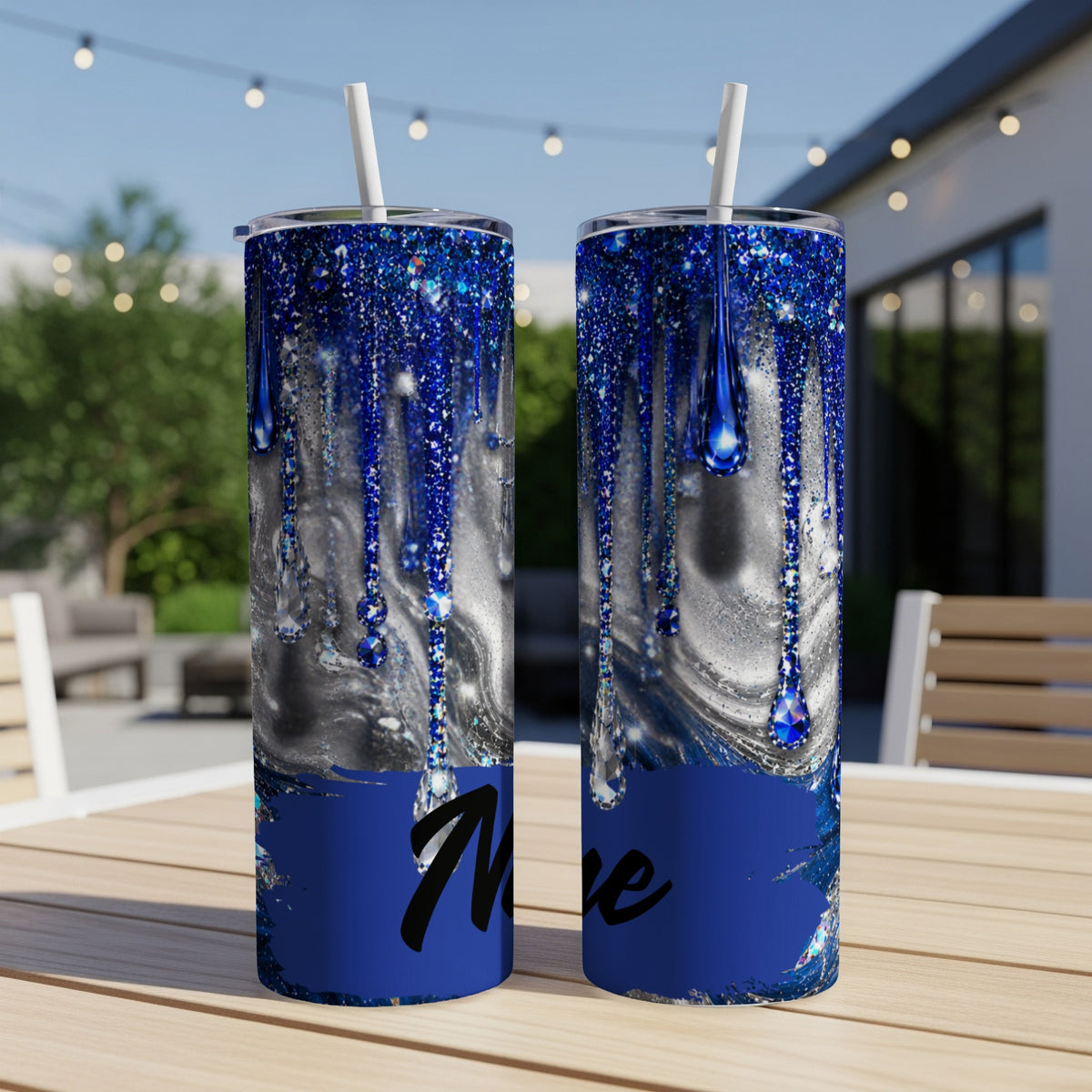 Two tumblers with blue glitter drip design and personalized name.