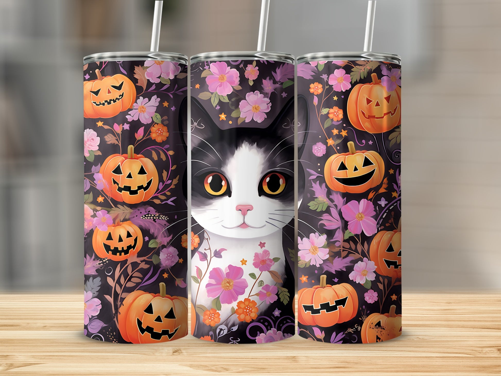 Black and white cat with pumpkins and flowers pattern on three tumblers.