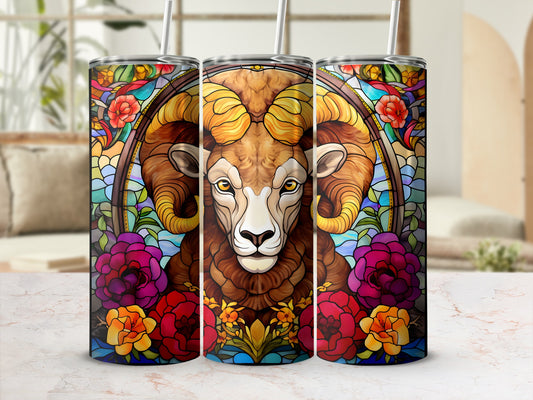 Stained glass ram with floral accents on a tumbler.