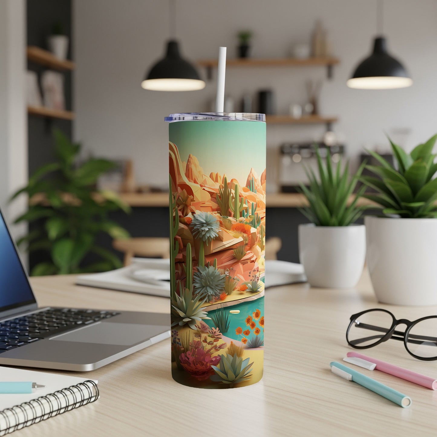 Tumbler with desert landscape and pool design.