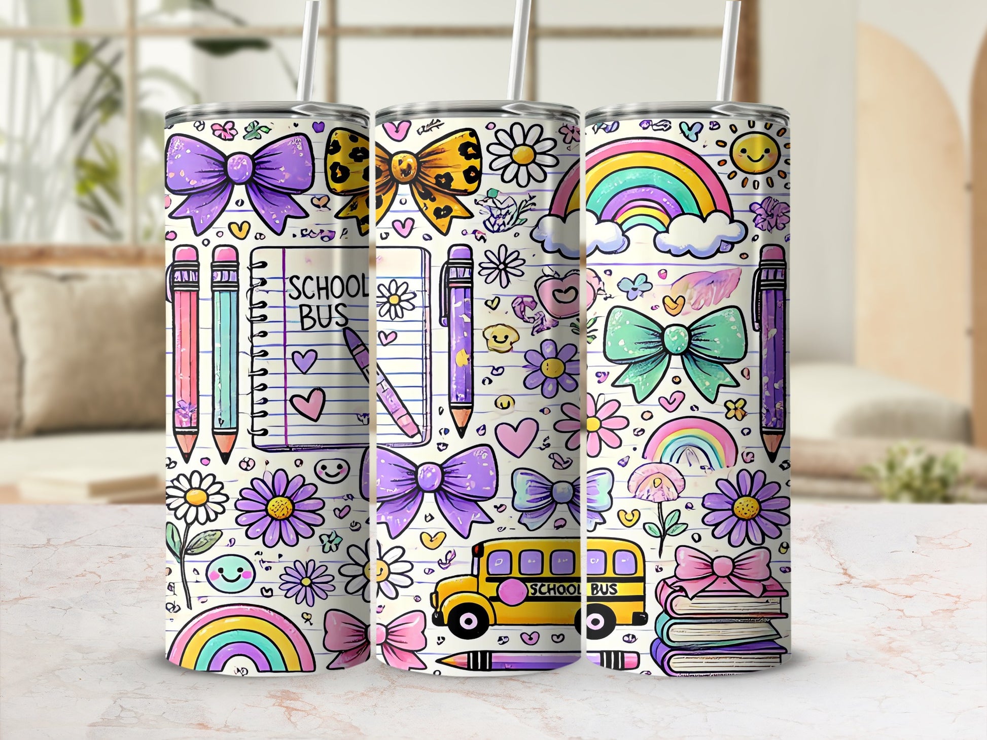Three patterned tumblers with school-themed drawings like bows, pencils, flowers, and school buses.