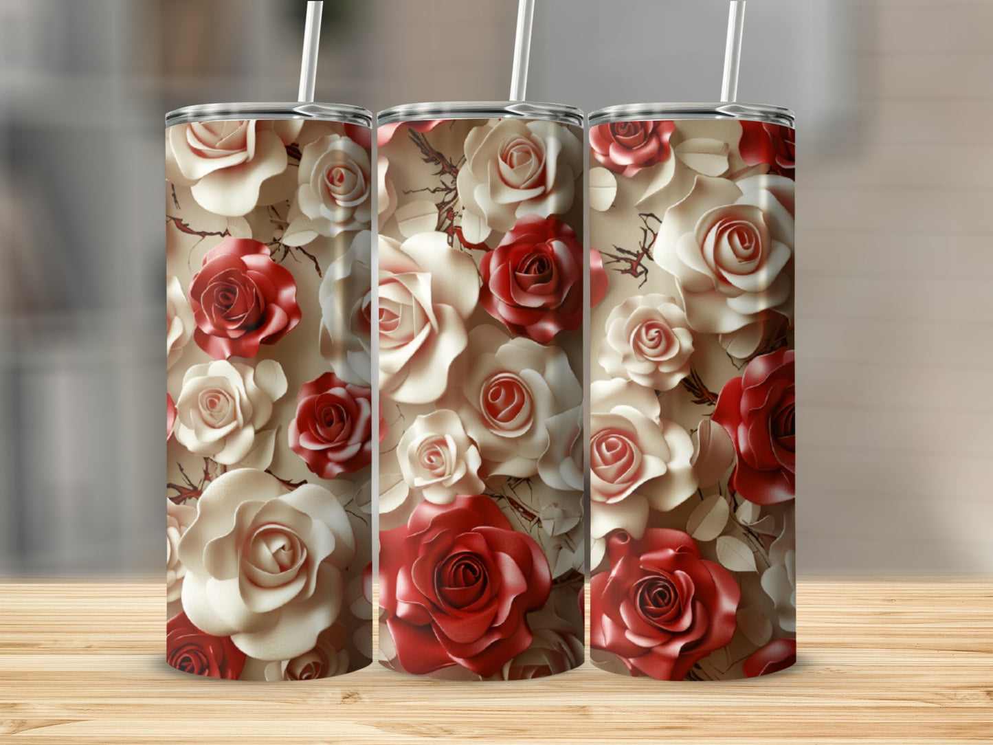 Three tumblers with a red and white rose floral pattern.