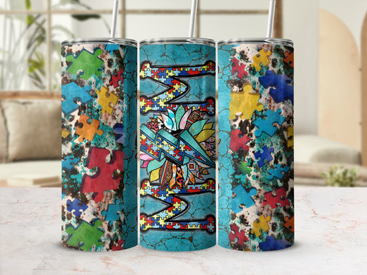 Three tumblers with a distressed teal and puzzle piece design.