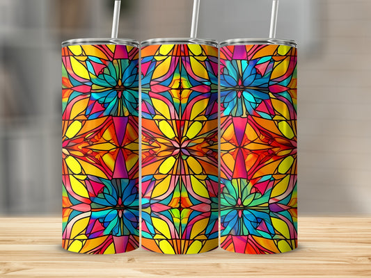 Three tumblers with colorful stained glass pattern on a wooden surface.