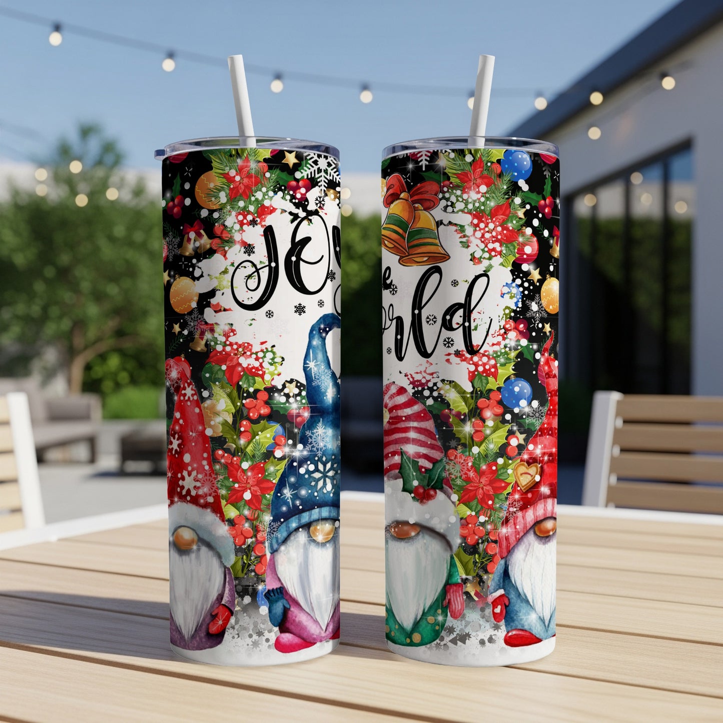Two tumblers with a Christmas gnome design and "Joy to the world" text.