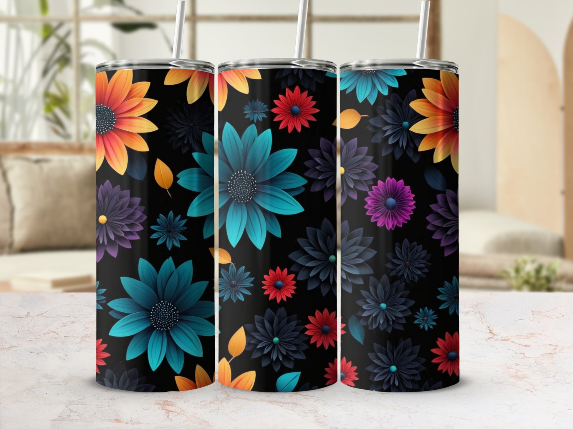 Three tall tumblers with floral designs, featuring bright flowers on a dark background.