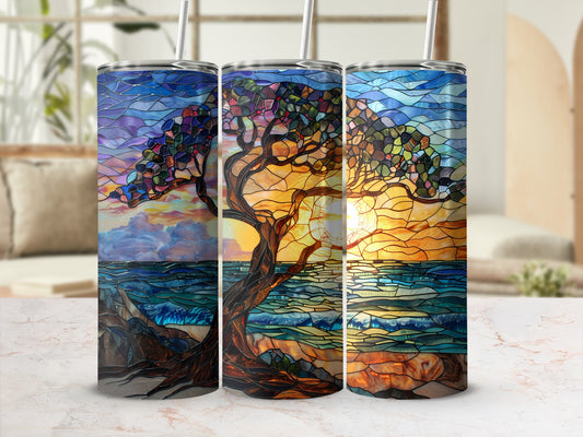 Three stained glass tumblers featuring a tree at sunset over the ocean.