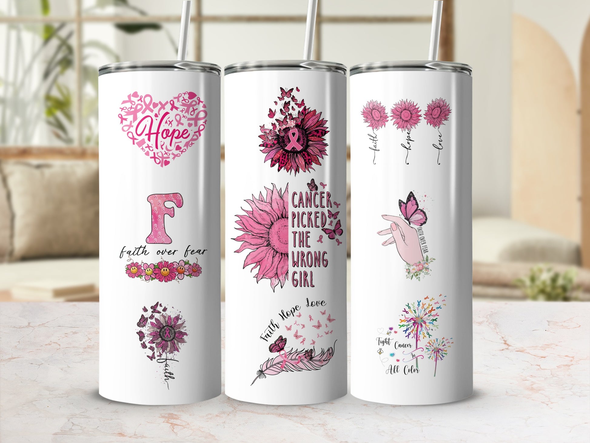 Pink inspirational tumblers with butterfly, flower, and motivational text designs.
