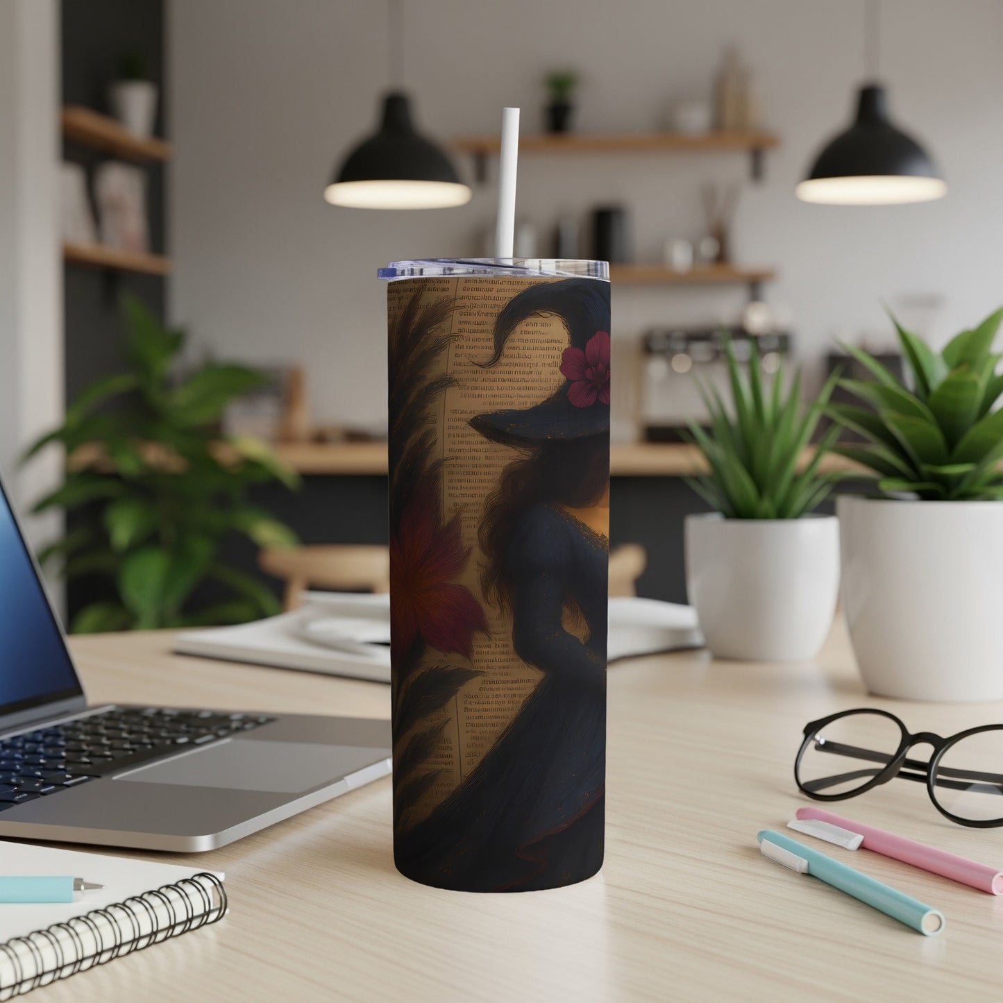 Tumbler with witch silhouette, floral accents, and vintage text design.