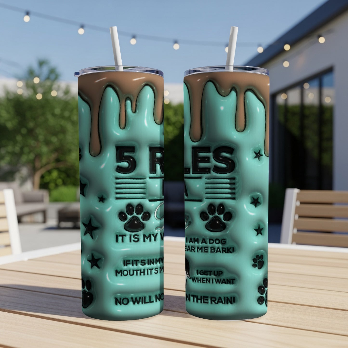 Two tumblers with "5 Rules" and dog-themed sayings on a patio.